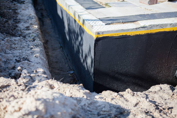 Professional Exterior Waterproofing technician working in Cambridge, MN